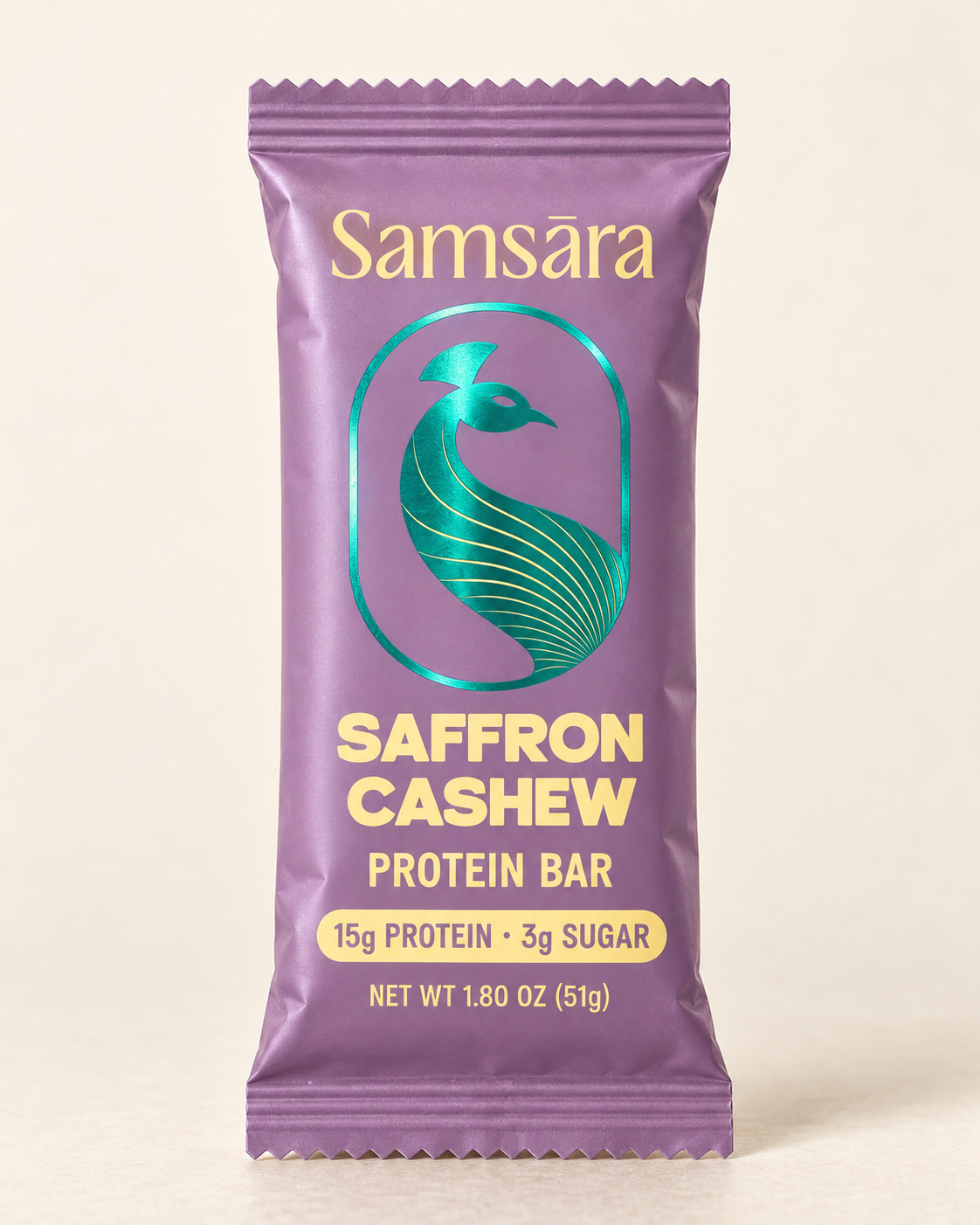 Saffron Cashew wrapped bar with teal foil peacock